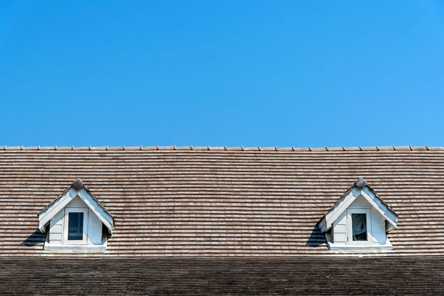 Public adjuster reviewing roof damage